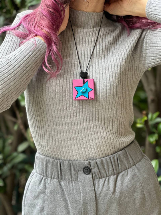 Simbolo Stella con pietra cucita a mano